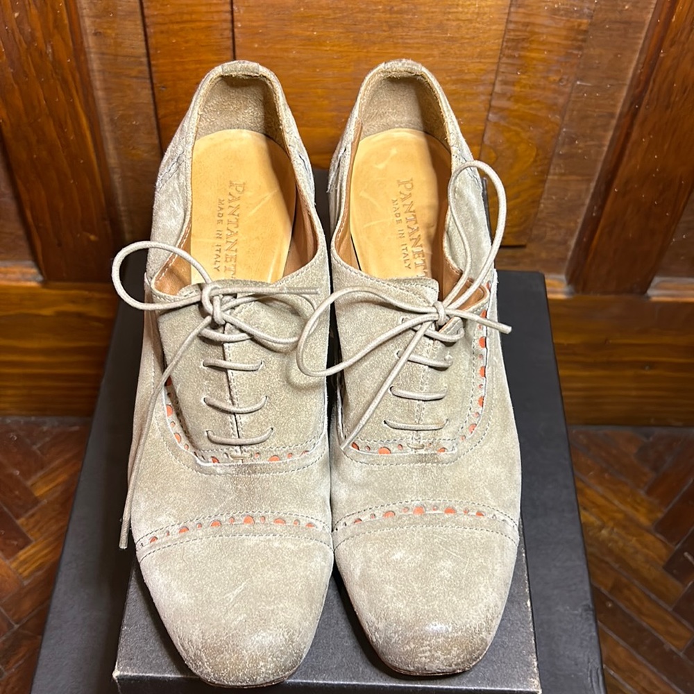 Color: Grey. Material: Suede. Leather soles/ wooden heels. Hand made in Italy